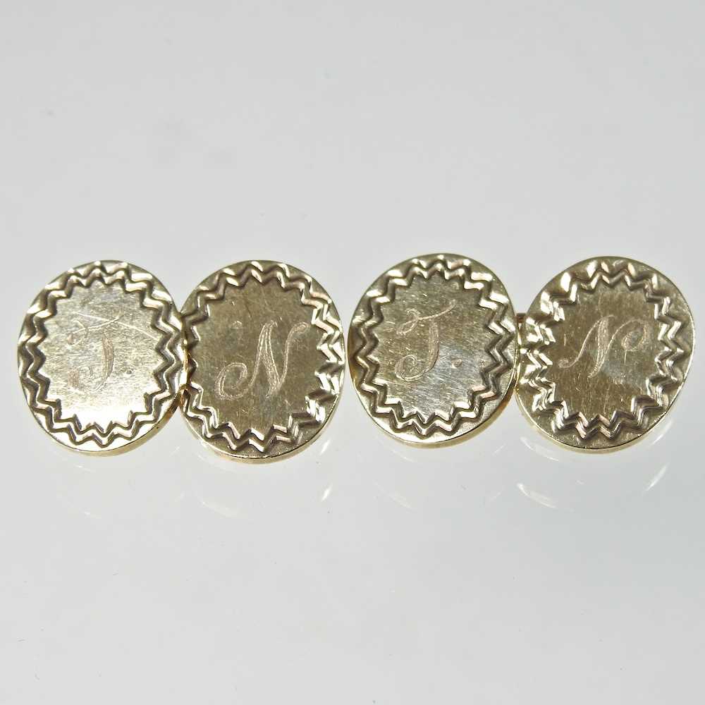 A pair of 9 carat gold cufflinks