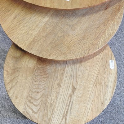 Lot 73 - A nest of three circular contemporary oak side...
