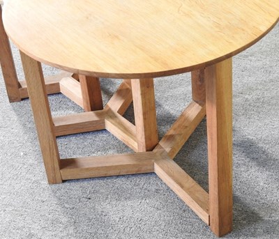 Lot 73 - A nest of three circular contemporary oak side...