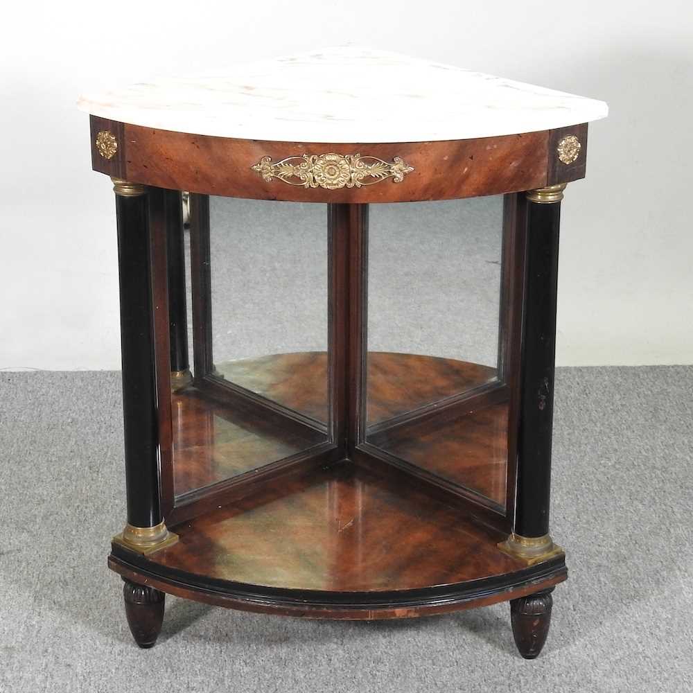 Lot 334 - A French marble top corner table, 20th century,...