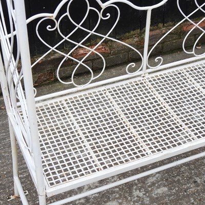 Lot 48 - A white painted metal garden arbour bench
