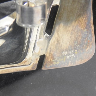 Lot 56 - A silver model of a junk ship, in a display...