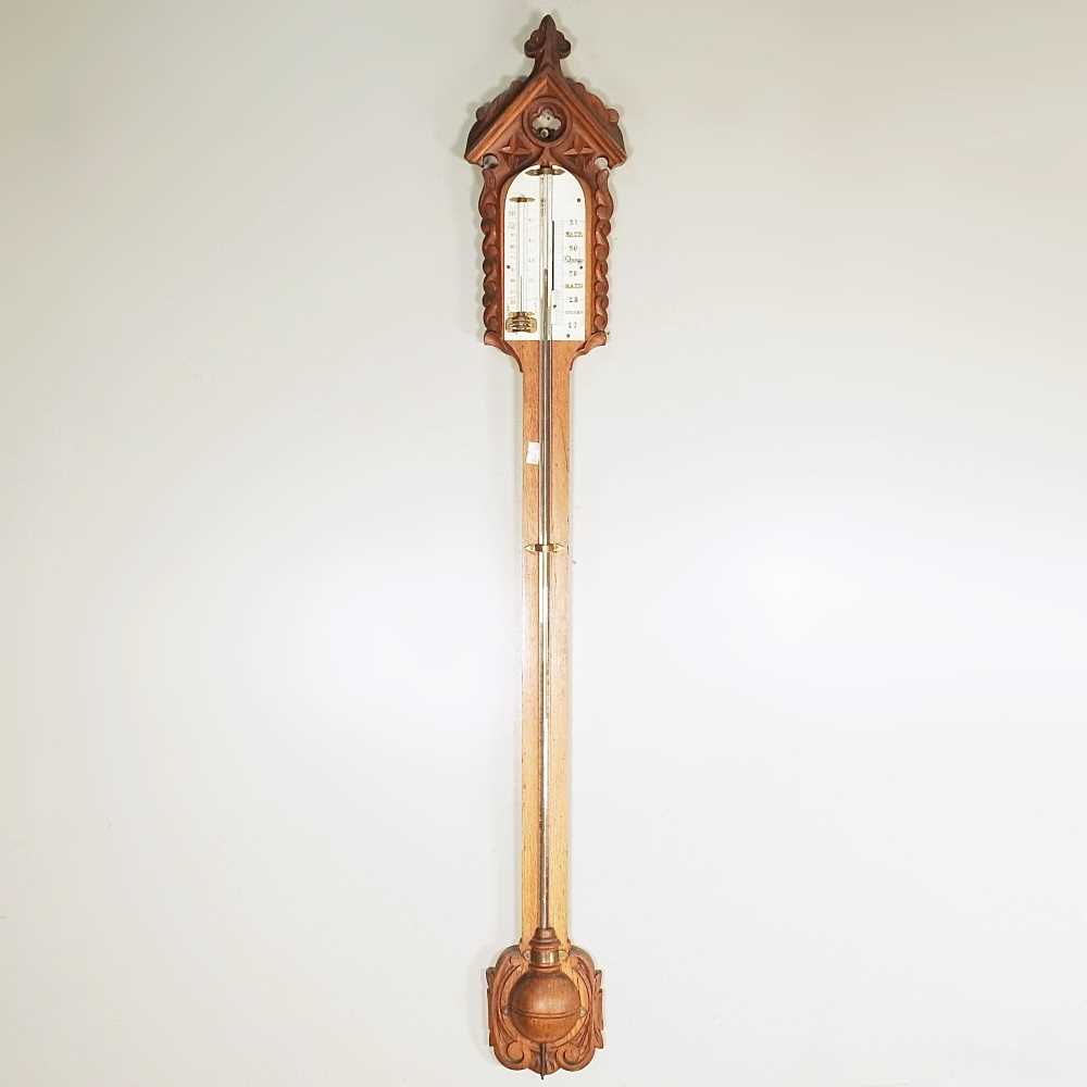 Lot 36 - A Victorian Gothic revival oak cased stick...