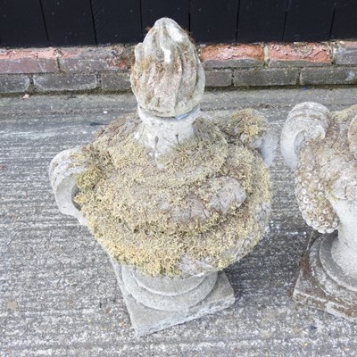 Lot 8 - A pair of weathered cast stone garden urns,...