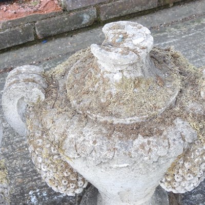 Lot 8 - A pair of weathered cast stone garden urns,...