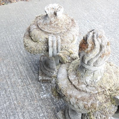 Lot 8 - A pair of weathered cast stone garden urns,...