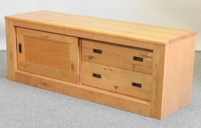 Lot 725 - A modern light oak side cabinet