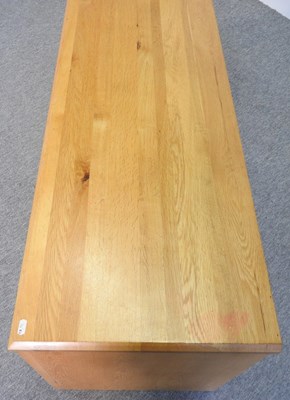 Lot 725 - A modern light oak side cabinet