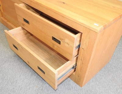 Lot 725 - A modern light oak side cabinet
