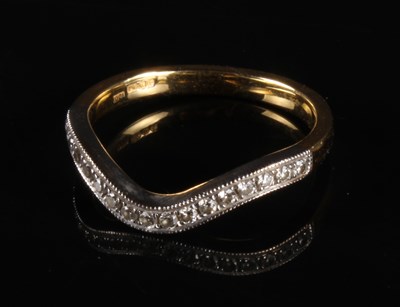 Lot 57 - An 18 carat gold and diamond dress ring, of...