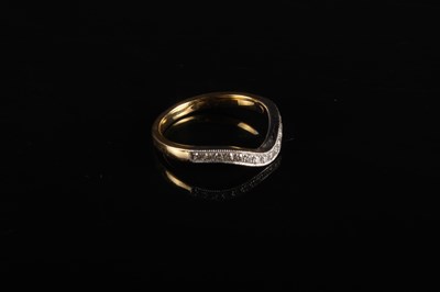Lot 57 - An 18 carat gold and diamond dress ring, of...