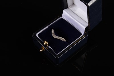 Lot 57 - An 18 carat gold and diamond dress ring, of...