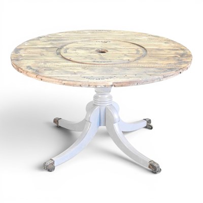 Lot 78 - A circular rustic garden table, on a painted...