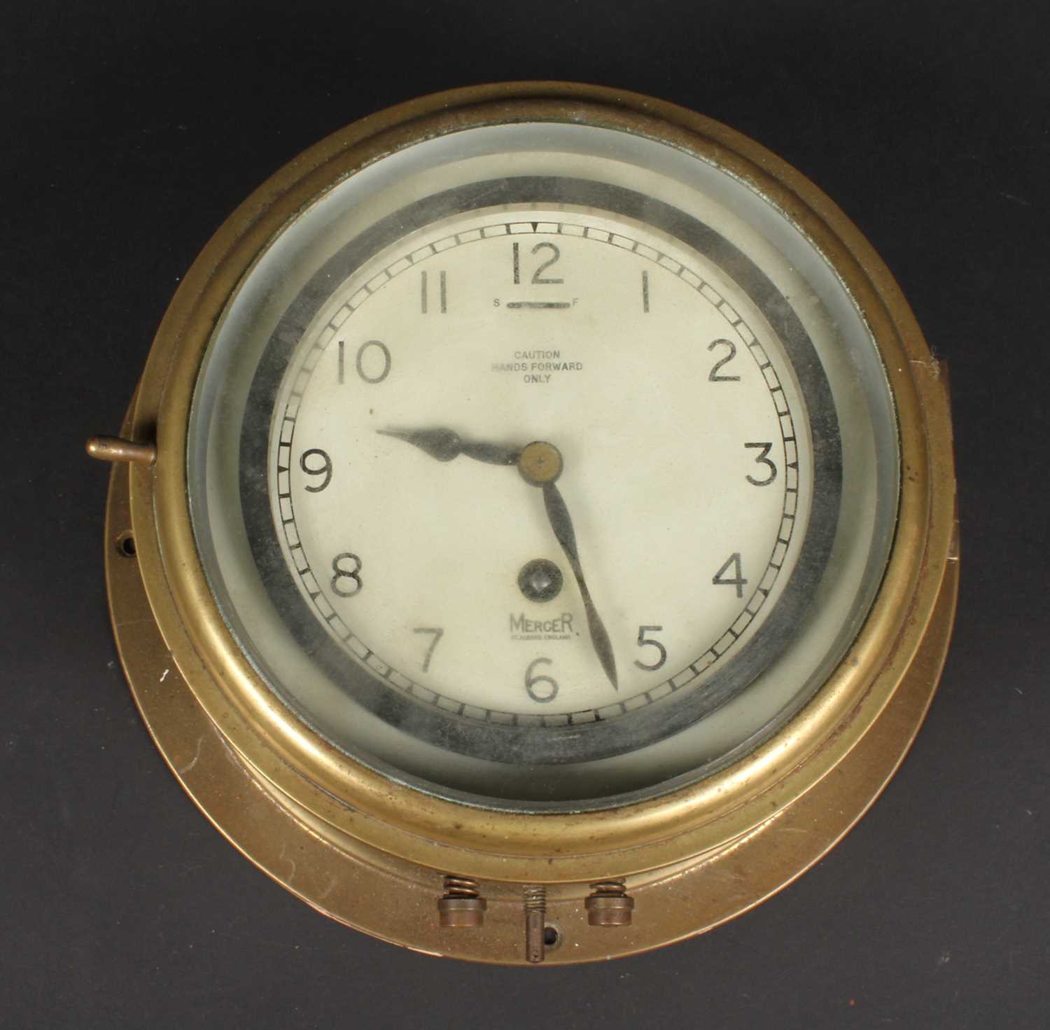 Lot 345 - A brass WWII ship's zig-zag clock, by Mercer...