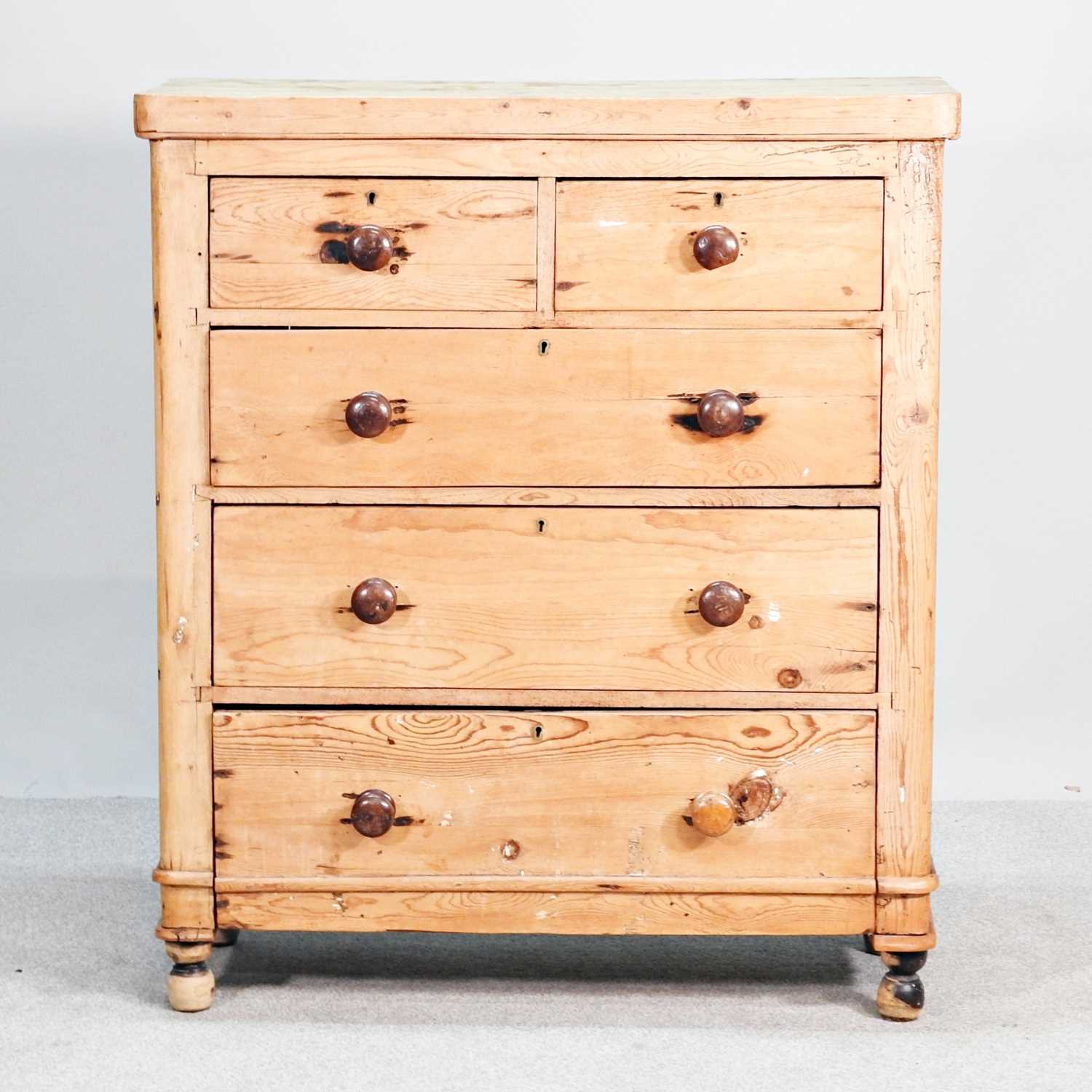 Lot 88 - An antique stripped pine chest of drawers, on...