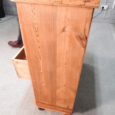 Lot 88 - An antique stripped pine chest of drawers, on...