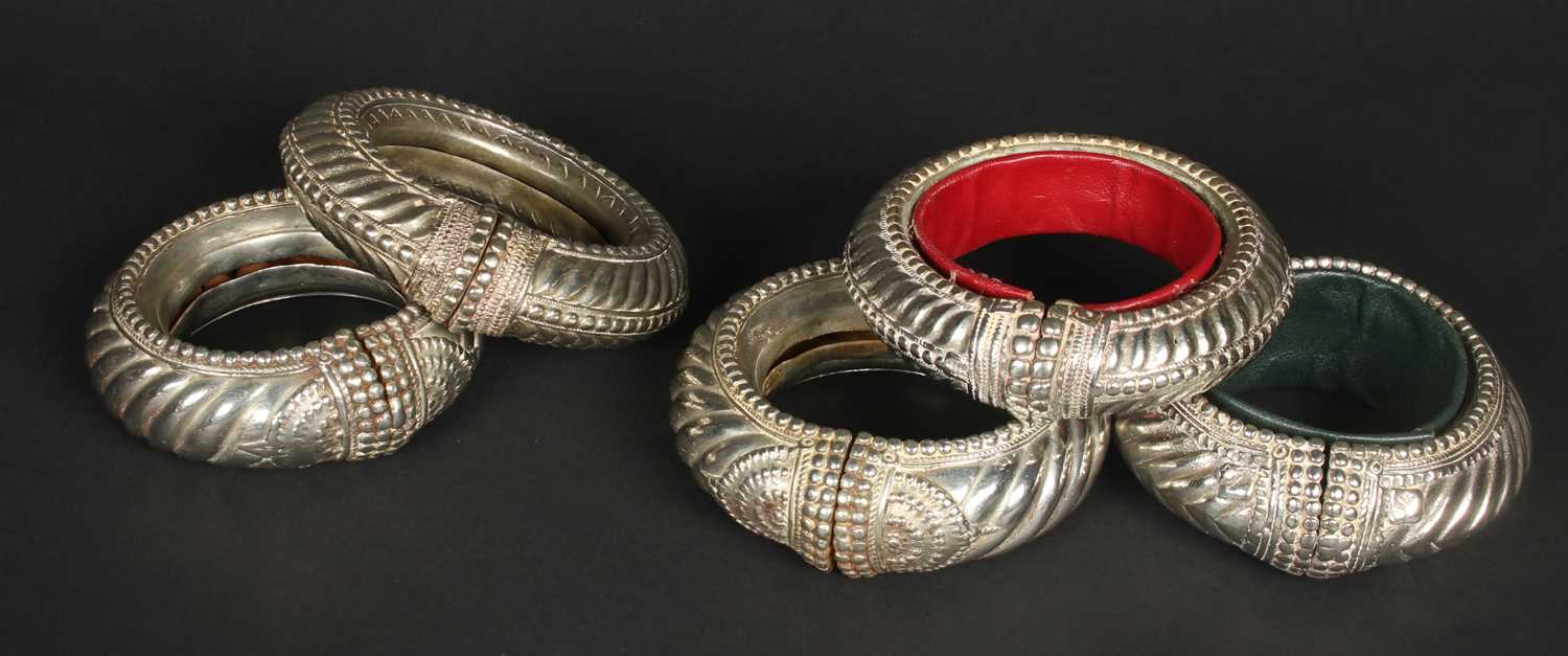 Lot 64 - Five Berber white metal wedding bangles