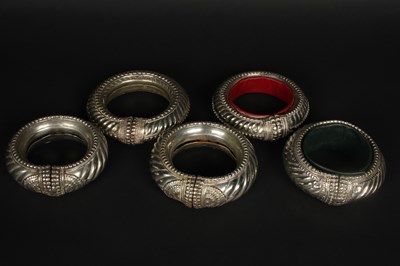 Lot 64 - Five Berber white metal wedding bangles