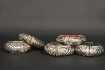 Lot 64 - Five Berber white metal wedding bangles