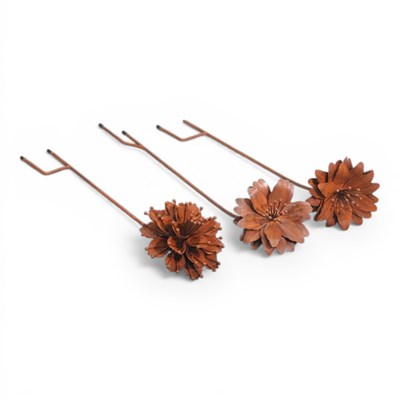 Lot 284 - A collection of three rusted metal garden...