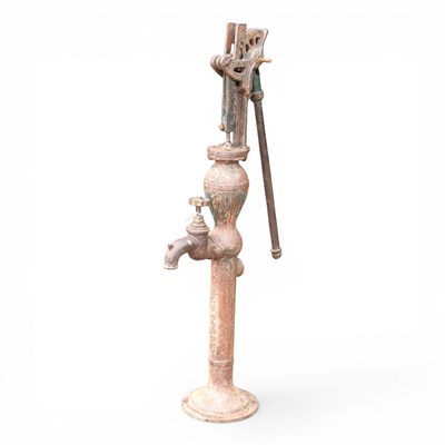 Lot 472 - A floor standing metal water pump, 127cm high
