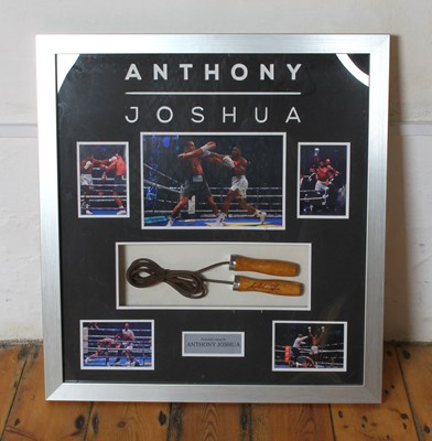 Lot 738 - A skipping rope, signed by Anthony Joshua,...