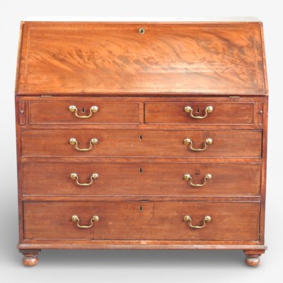Lot 602 - A George III mahogany bureau, with a fitted...