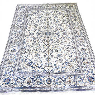 Lot 533 - A Persian kashan carpet, with scrolling floral...