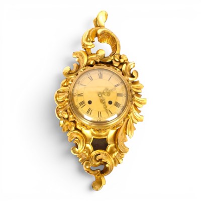 Lot 685 - A Rococo style giltwood cartel clock, 57cm high