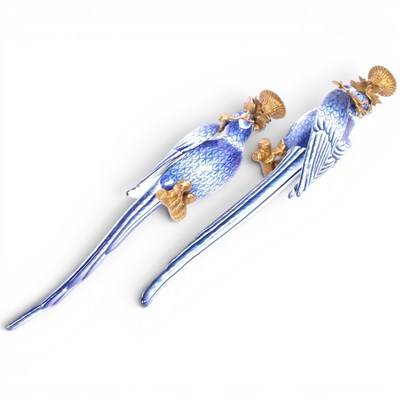 Lot 248 - A pair of Rococo style blue and white and gilt...