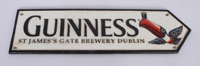 Lot 725 - A cast iron Guinness advertising sign