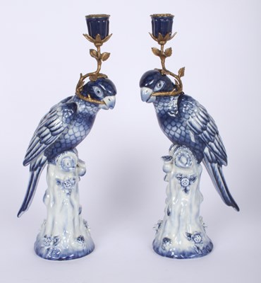 Lot 127 - A pair of Rococo style blue and white...