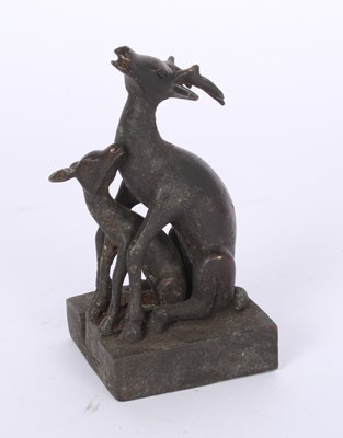 Lot 182 - A Chinese metal double deer seal