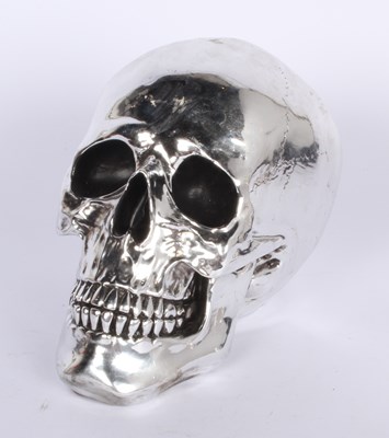 Lot 729 - A silvered model of a skull