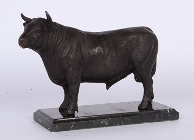Lot 163 - A bronze bull mounted on marble plinth
