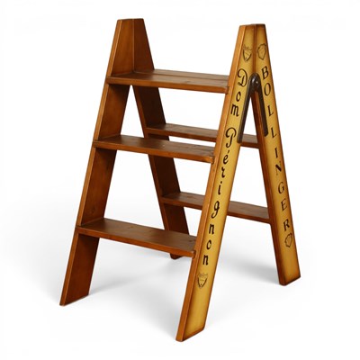 Lot 560 - A wooden champagne ladder, h.85cm
