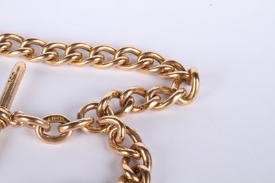 Lot 6 - A 15 carat yellow gold curb link chain with...