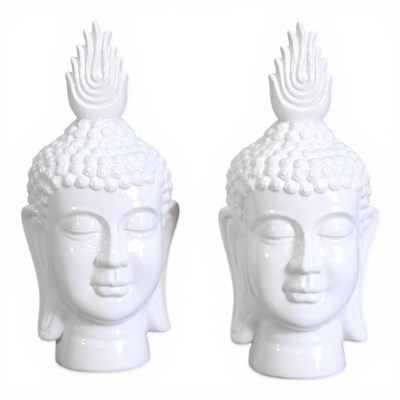 Lot 548 - A pair of white porcelain busts of Buddha...