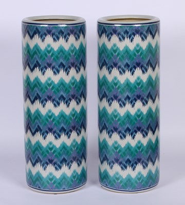 Lot 195 - A pair of porcelain umbrella stands, each 61cm...