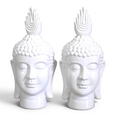 Lot 589 - A pair of glazed porcelain heads of Buddha,...
