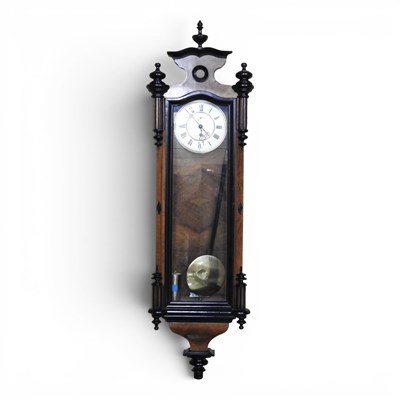 Lot 756 - A 19th century Vienna style wall clock, with a...