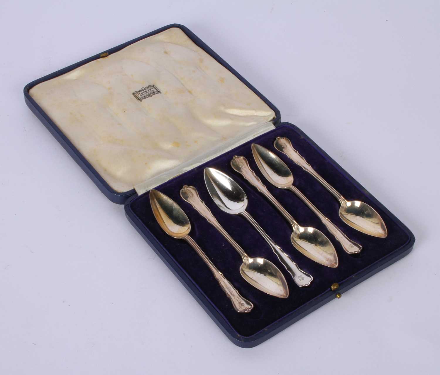 Lot 58 - A set of six George V silver spoons, London...