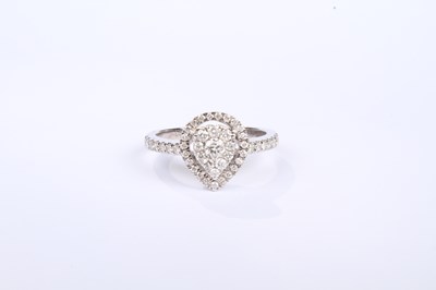 Lot 16 - A 9 carat white gold pear shaped diamond...