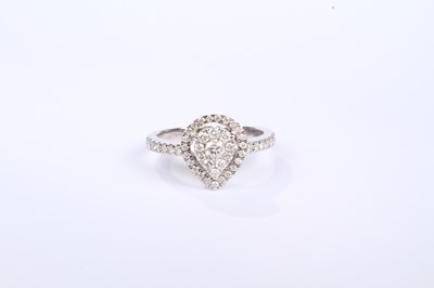 Lot 16 - A 9 carat white gold pear shaped diamond...