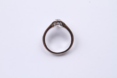 Lot 24 - An 18 carat white gold tanzanite and diamond...
