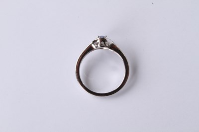 Lot 24 - An 18 carat white gold tanzanite and diamond...