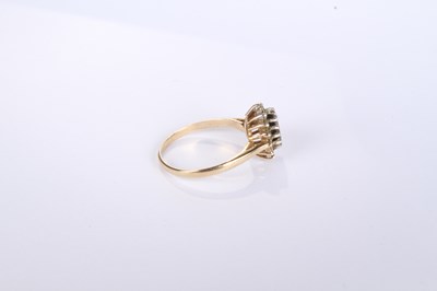 Lot 12 - A 9 carat yellow gold pear shaped sapphire and...
