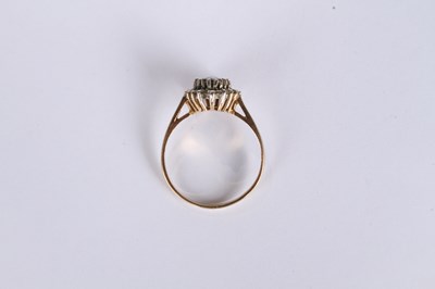 Lot 12 - A 9 carat yellow gold pear shaped sapphire and...