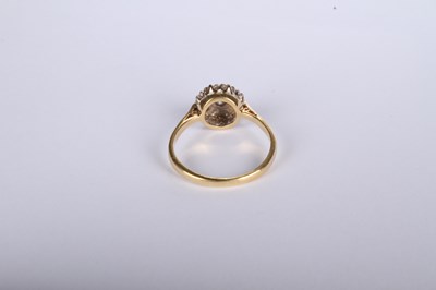 Lot 20 - An 18 carat yellow gold diamond cluster ring,...