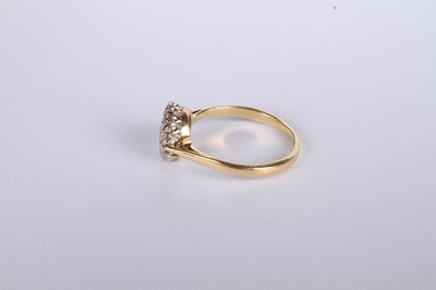 Lot 20 - An 18 carat yellow gold diamond cluster ring,...